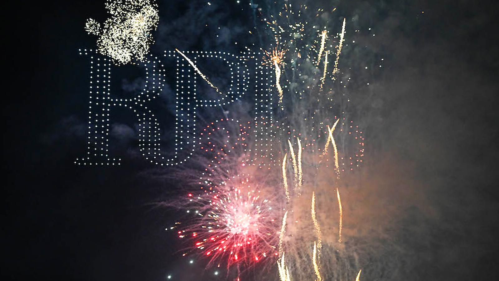 Drones create the RPI Bicentennial logo in the night sky and are complemented with fireworks