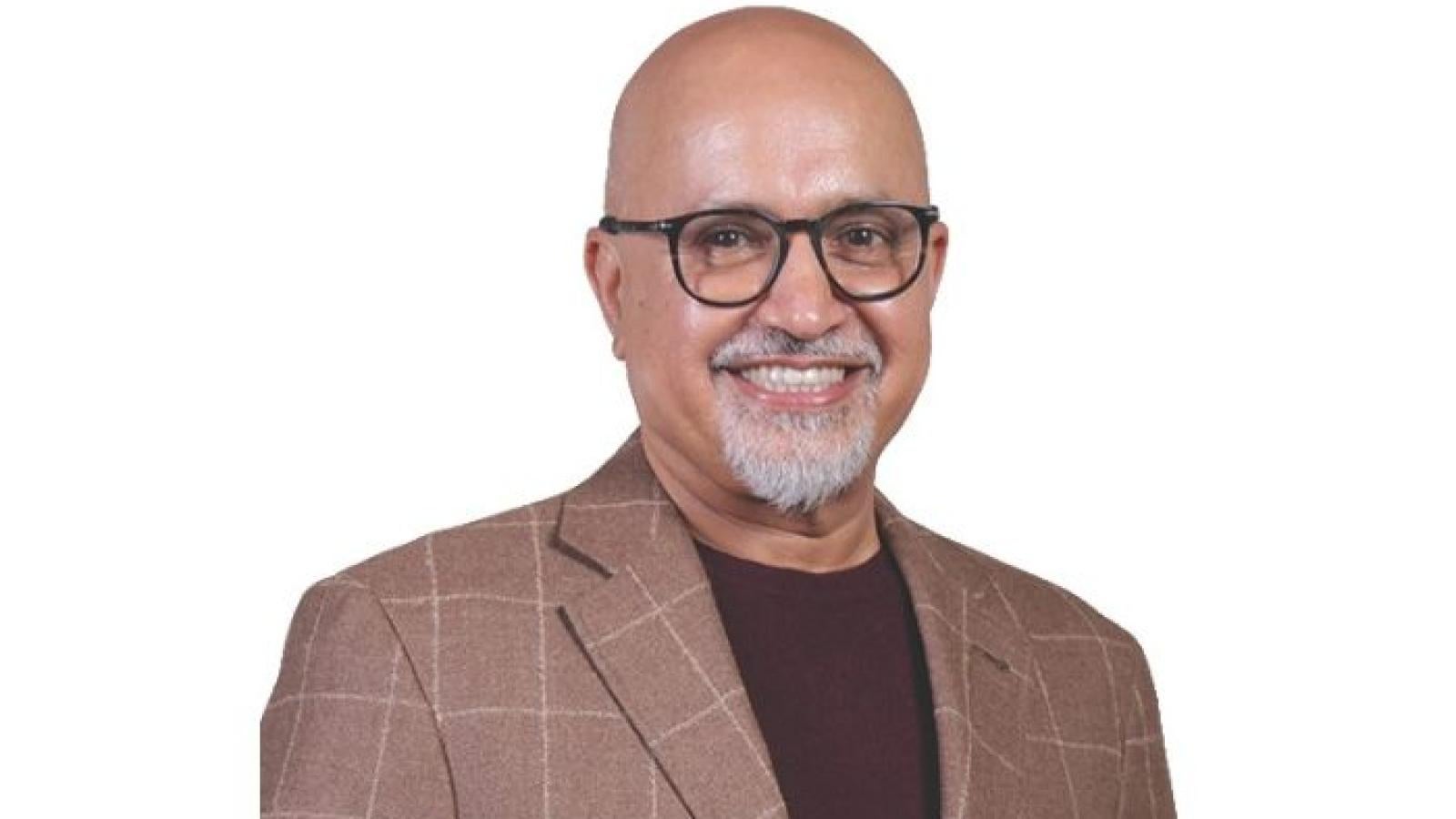 Headshot of Ajit Prabhu against white background