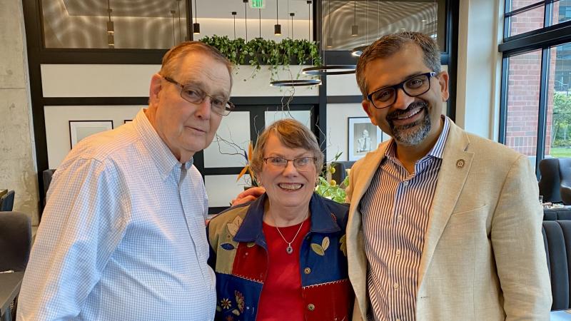 Ned Feltham, Nanci Feltham, and Shekhar Garde standing next to each other and smiling