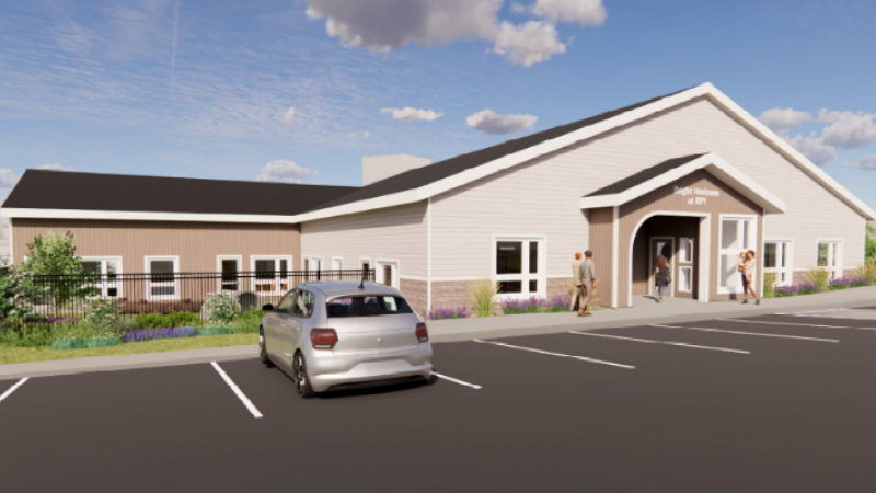 External rendering of daycare center; a single-story white and brown building labeled "Bright Horizons at RPI"