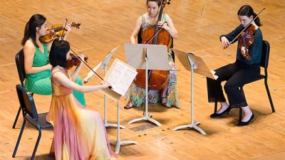 Kurtag's 12 Microludes for string quartet presented by TMC fellows Zili Sha, Sheena Lan, Kelly Avila, and Ji Sun Jung in Ozawa Hall (Hilary Scott)